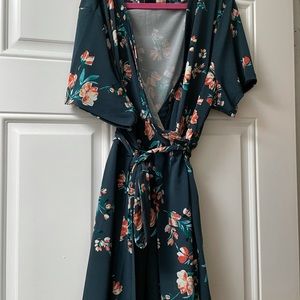 Torrid Size 2 Faux wrap top. This top is incredible flattering!